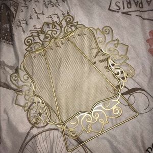 A Jewelry stand/holder. More useful with earrings